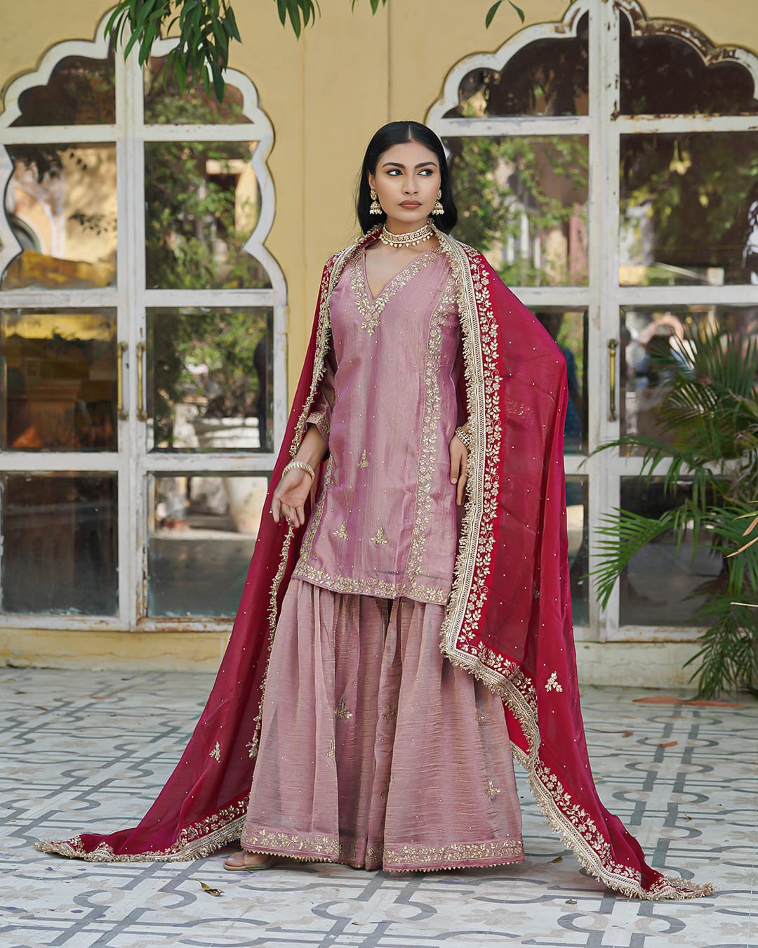 Teal lehenga with dupatta on white background